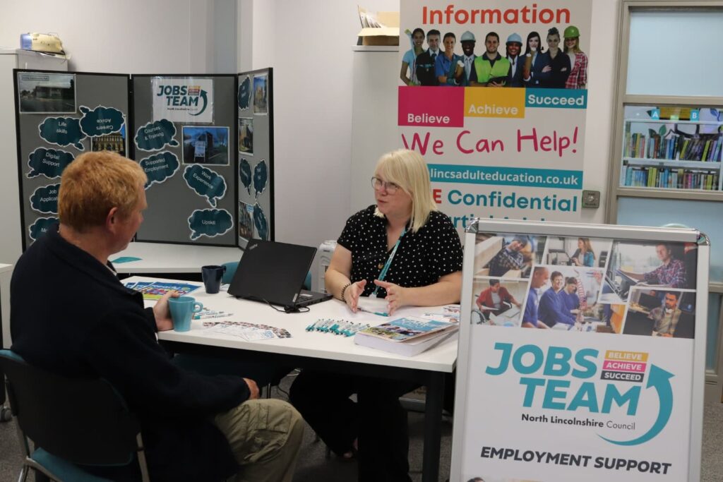 One person explaining something to the other person